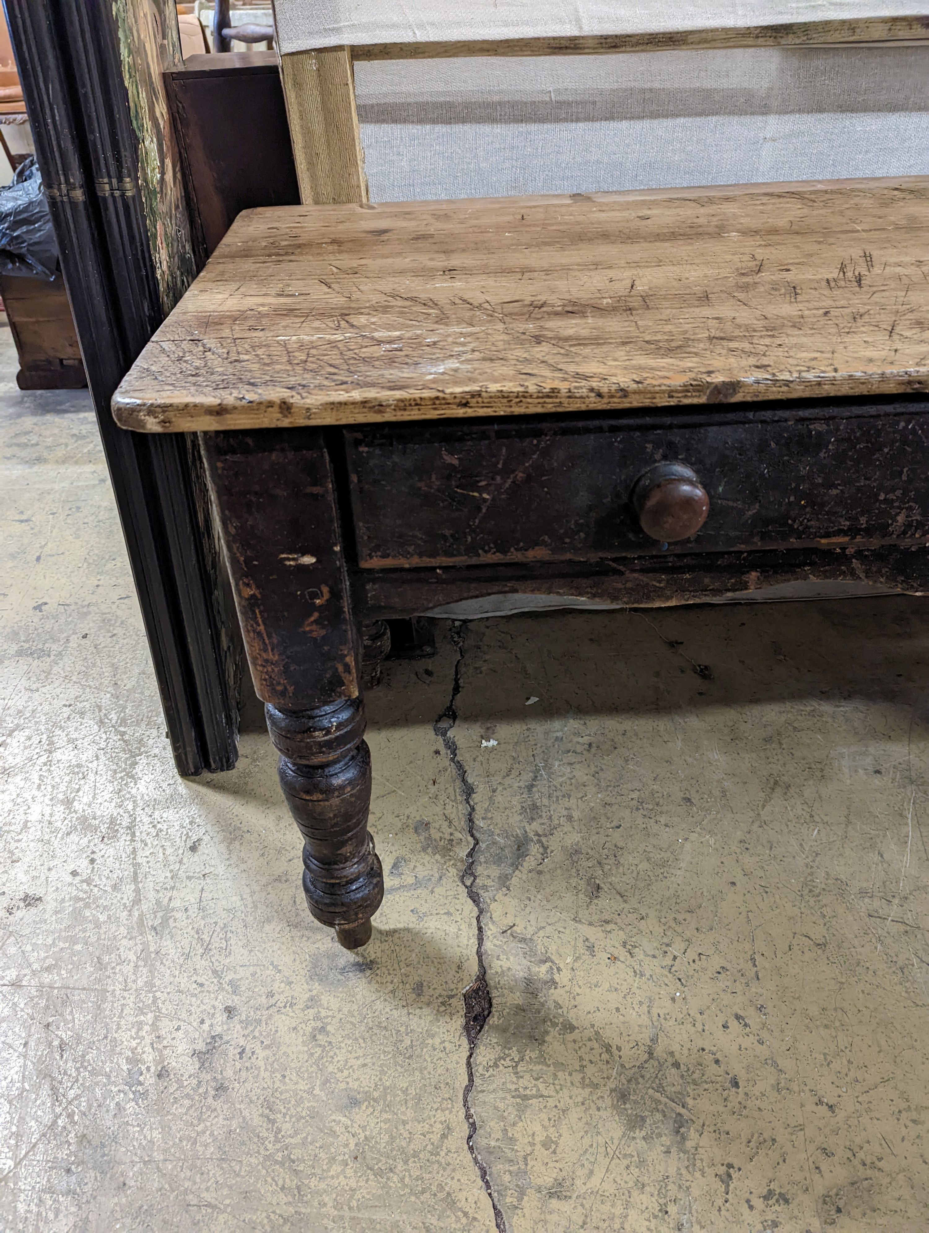 A Victorian pine two drawer kitchen table. W-133cm, D-66cm, H-73cm.